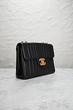 FWRD Renew Chanel Vintage Jumbo Caviar Turnlock Single Flap Bag in Black, view 4, click to view large image.