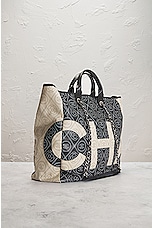 FWRD Renew Chanel Camellia Coated Canvas Tote Bag in Black, view 4, click to view large image.
