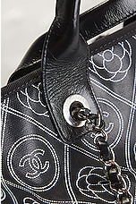 FWRD Renew Chanel Camellia Coated Canvas Tote Bag in Black, view 7, click to view large image.