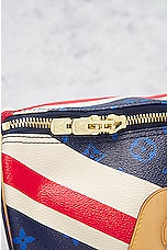FWRD Renew Louis Vuitton MonogramJack Keepall Bandouliere Bag in Blue & Red, view 7, click to view large image.