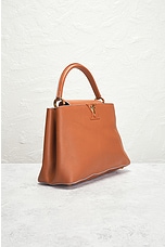 FWRD Renew Louis Vuitton Capucines Handbag in Brown, view 4, click to view large image.