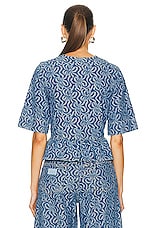Ganni Jacquard Denim Flounce Tie Blouse in Mid Blue Stone, view 3, click to view large image.
