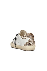 Golden Goose Super Star Leather Sneaker in Optic White, Seed Pearl, Black & Gold, view 3, click to view large image.