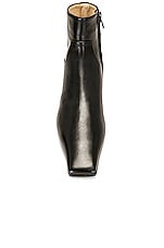 KHAITE Marfa Classic Flat Ankle Boot in Black, view 4, click to view large image.