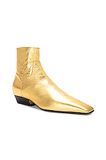 KHAITE Marfa Classic Flat Ankle Boot in Gold, view 2, click to view large image.