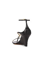 KHAITE Marion Ankle Strap Wedge Sandal in Black, view 3, click to view large image.