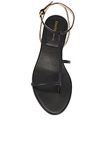 KHAITE Jones T-strap Flat Sandal in Black, view 4, click to view large image.
