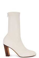 KHAITE Apollo 85 Mid Heel Boot in Cream, view 1, click to view large image.