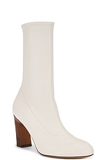 KHAITE Apollo 85 Mid Heel Boot in Cream, view 2, click to view large image.