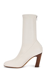 KHAITE Apollo 85 Mid Heel Boot in Cream, view 5, click to view large image.