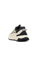 Moncler Lite Runner Low Top Sneakers in White & Black, view 3, click to view large image.