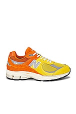 New Balance 2002R in Ginger Lemon, Classic Orange, & Shadow Grey, view 1, click to view large image.