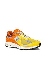 New Balance 2002R in Ginger Lemon, Classic Orange, & Shadow Grey, view 2, click to view large image.