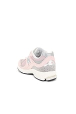 New Balance 2002r in Orb Pink, Shadow Grey, & Silver Metallic, view 3, click to view large image.