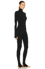 Norma Kamali Long Sleeve Turtleneck Catsuit with Footie in Black, view 3, click to view large image.