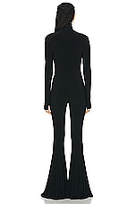 Norma Kamali Long Sleeve Turtleneck Fishtail Jumpsuit in Black, view 3, click to view large image.