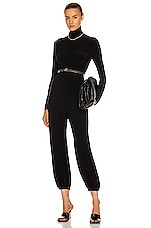 Norma Kamali Turtleneck Jog Jumpsuit in Black, view 1, click to view large image.