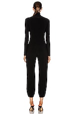 Norma Kamali Turtleneck Jog Jumpsuit in Black, view 3, click to view large image.