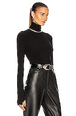 Norma Kamali Slim Fit Long Sleeve Turtleneck Top in Black, view 2, click to view large image.