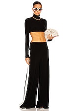 Norma Kamali Cropped Slim Fit Long Sleeve Turtleneck Top in Black, view 4, click to view large image.