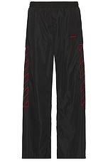 OFF-WHITE Outline Diag Nylon Trackpant in Black, view 1, click to view large image.