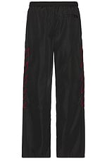 OFF-WHITE Outline Diag Nylon Trackpant in Black, view 2, click to view large image.