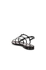 Saint Laurent Cassandra Flat Sandals in Noir, view 4, click to view large image.