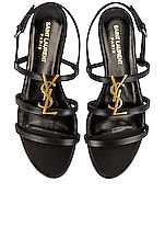 Saint Laurent Cassandra Leather Flat Sandals in Nero, view 1, click to view large image.