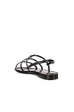 Saint Laurent Cassandra Leather Flat Sandals in Nero, view 4, click to view large image.