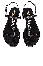 Saint Laurent Cassandra Embossed Croc Flat Sandals in Noir, view 1, click to view large image.