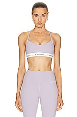 Sporty & Rich 80s Runner Sports Bra in Faded Lilac & Black, view 1, click to view large image.