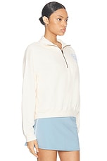 Sporty & Rich Emblem Quarter Zip Sweatshirt in Coconut & Sky Blue, view 2, click to view large image.