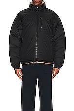 The North Face 92 Reversible Nuptse Jacket in Almond Butter & Tnf Black, view 6, click to view large image.