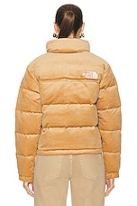 The North Face 92 Reversible Nuptse Jacket in Almond Butter & Coal Brown, view 4, click to view large image.