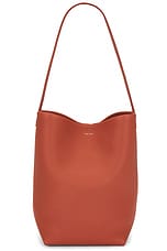 The Row Medium N/S Park Tote Bag in Rust PLD, view 1, click to view large image.