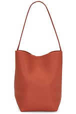 The Row Medium N/S Park Tote Bag in Rust PLD, view 3, click to view large image.