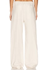Toteme Cotton Drawstring Trousers in Stone, view 3, click to view large image.