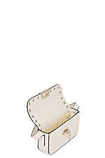 Valentino Garavani Rockstud Mini Shoulder Bag in Ivory, view 5, click to view large image.