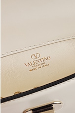 Valentino Garavani Rockstud Mini Shoulder Bag in Ivory, view 6, click to view large image.