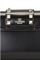 Valentino Garavani Small Rockstud Clutch in Nero, view 7, click to view large image.