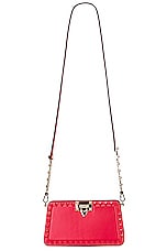 Valentino Garavani Rockstud Clutch in Rouge Pur, view 1, click to view large image.