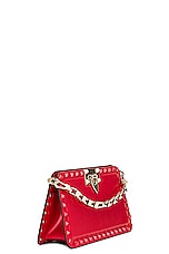 Valentino Garavani Rockstud Clutch in Rouge Pur, view 5, click to view large image.