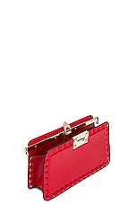 Valentino Garavani Rockstud Clutch in Rouge Pur, view 6, click to view large image.