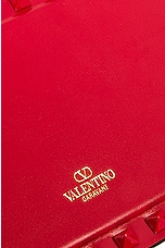 Valentino Garavani Rockstud Clutch in Rouge Pur, view 7, click to view large image.