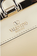 Valentino Garavani Rockstud Clutch in Ivory, view 7, click to view large image.