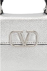 Valentino Garavani V Sling Micro Top Handle Bag in Silver, view 8, click to view large image.