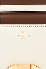 Valentino Garavani Small V Logo O'clock Shoulder Bag in Ivory, view 7, click to view large image.