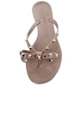 Valentino Garavani Rockstud Bow PVC Jellys in Nude & Platinum, view 4, click to view large image.
