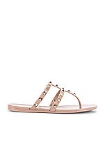 Valentino Garavani Summer Rockstud PVC Thong Sandal in Poudre, view 1, click to view large image.