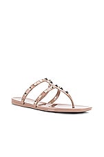 Valentino Garavani Summer Rockstud PVC Thong Sandal in Poudre, view 2, click to view large image.